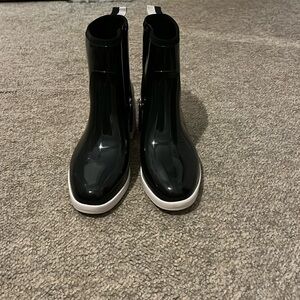 Kate Spade black and white rain boots.